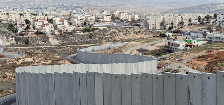 Israeli separation wall divides Shuafat Refugee Camp, Pisgat Zeev Israeli Settlement in West Bank